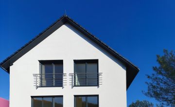 Kliknutím zvětšíte Fasáda patrového domu od spol. ALFAHAUS v Praze Hostivaři.